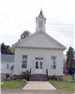 White Church with Brick Staircase Entrance