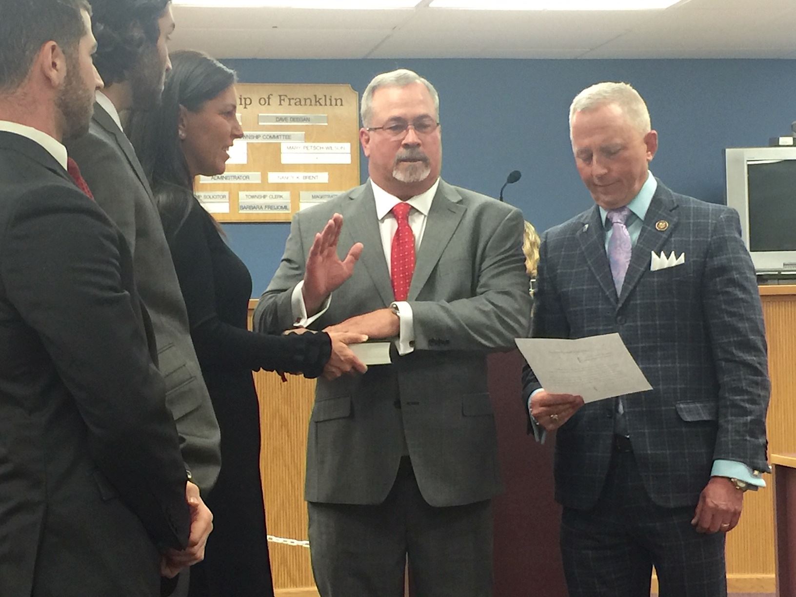 Jake Bruno being sworn in as mayor by Jeff Van Drew