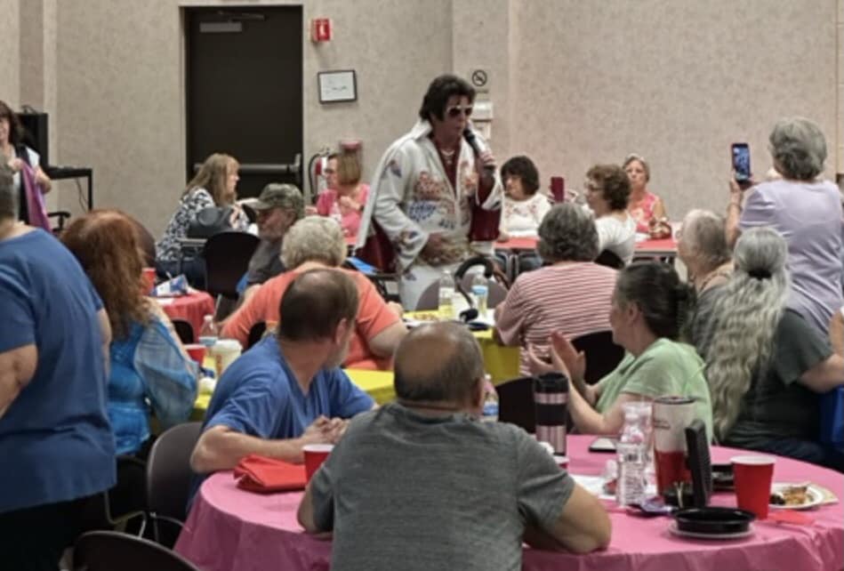 2023 Seniors Picnic Elvis Singing to Crowd